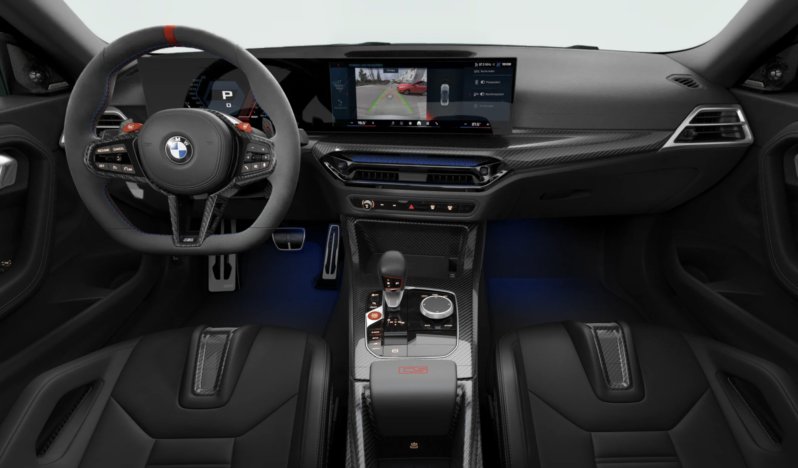 Digitální kokpit BMW M2 CS s M režimy, sportovními displeji a ovládacím rozhraním s karbonovými detaily.